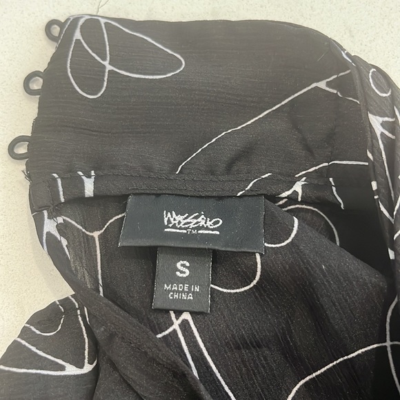 New sleeveless blouse - Picture 4 of 9